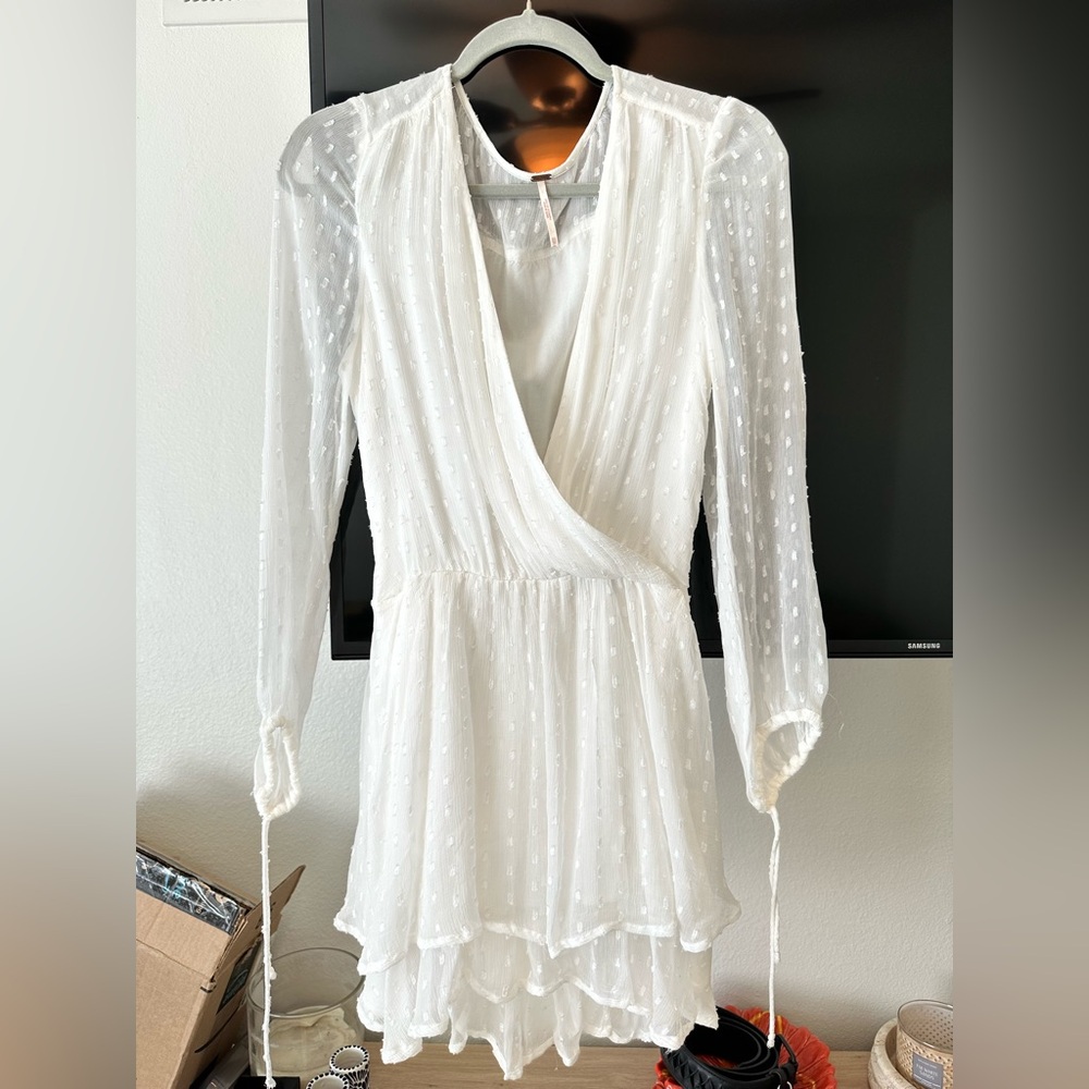 ‘Free People’ Holly Dahlia Swiss Dot Surplice Mini Dress for sale!